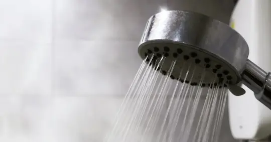 hot water flowing from shower head