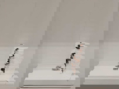 a toilet tank and a tissue