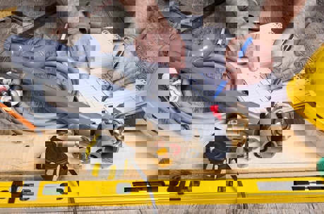 a plumber doing a sketch for the repair